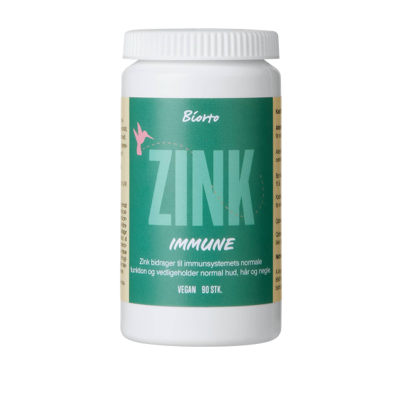 Biorto Zink Immune, en hvid d�se med en flot m�rkegr�n etiket. Der er afbildet en lille lyser�d fugl (kolibri) over teksten 'ZINK IMMUNE'. Vegansk, 90 stk.