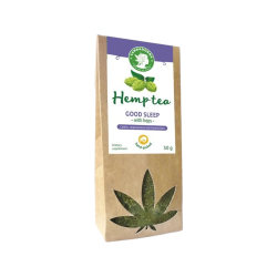 En papirspose med Cannadorra Hemp Tea Good Sleep, dekoreret med et lilla banner, gr�nne humlekopper og et udsk�ret hampeblad, der viser teen indeni.