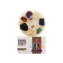 En eksklusiv hvid �ske til Chakra Crystal Candle med teksten 'Seven Stones' og en illustration af en mediterende figur med syv lysende chakraer.