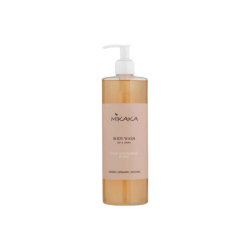 Opretst�ende transparent flaske med Mikaka Body Wash Oat & Linden. S�ben har en gylden farve, og den elegante etiket er ferskenfarvet med et smukt, minimalistisk botanisk logo.