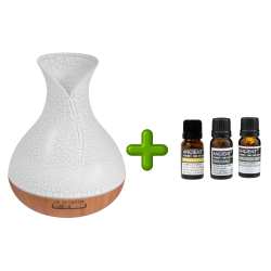 En flot pakkel�sning med en hvid vaseformet Palermo Aroma Diffuser med tr�lignende base til venstre, og tre m�rke 10ml flasker med �terisk olie (Frankincense, Oregano og Melissa Blend) til h�jre, adskilt af et plus-tegn.