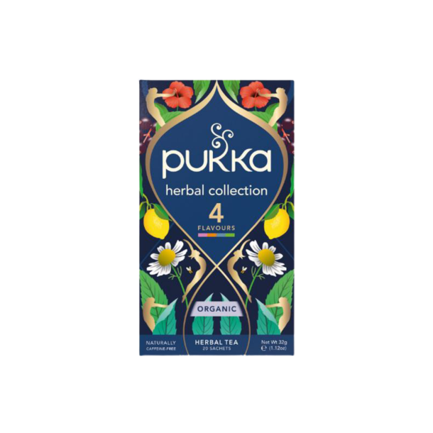 Opretst�ende Pukka Herbal Collection te�ske. �sken er smuk dyb bl� og dekoreret med elegante gyldne m�nstre, gule citroner, mynteblade og hvide margueritblomster.
