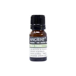 En lille m�rk ravfarvet glasflaske med sort skruel�g indeholdende 10 ml ren �kologisk �terisk Tea Tree olie. Etiketten siger 'Ancient Wisdom, Organic Tea Tree, Origin Australia'.